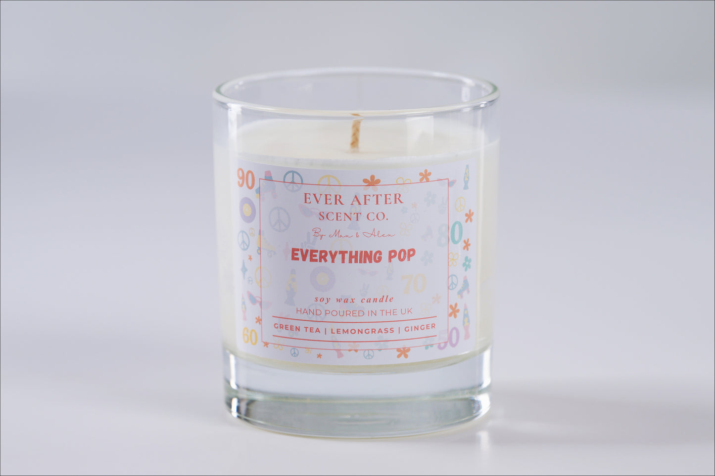 Candle with 'Ever After Scent Co.' label on a white background Everything POP