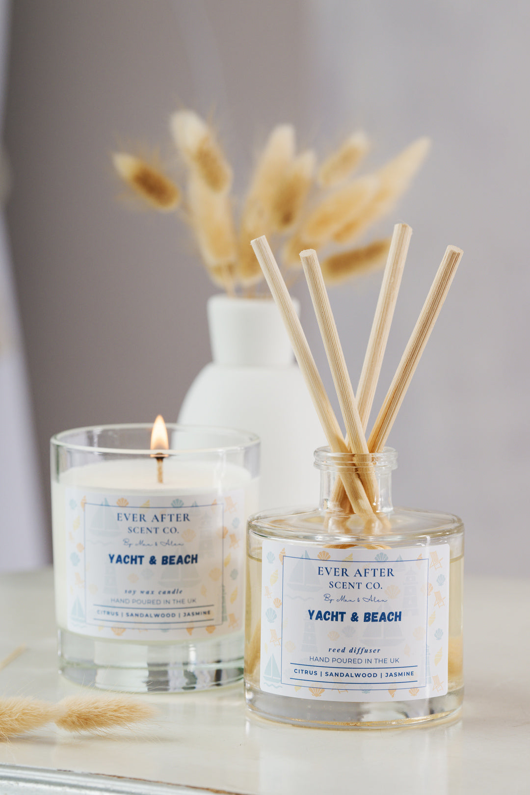 Yacht & Beach Resort Disney Candle and diffuser scent set with 'Ever After Scent Co.' labels on a neutral background