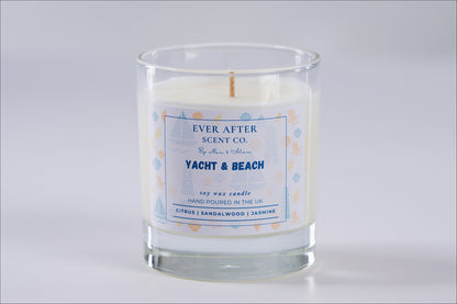 Ever After Scent Co Yacht & Beach Candle in a glass jar with a label on a gray background