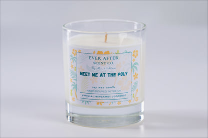 meet me at the poly Candle with a label from Ever After Scent Co. on a light gray background
