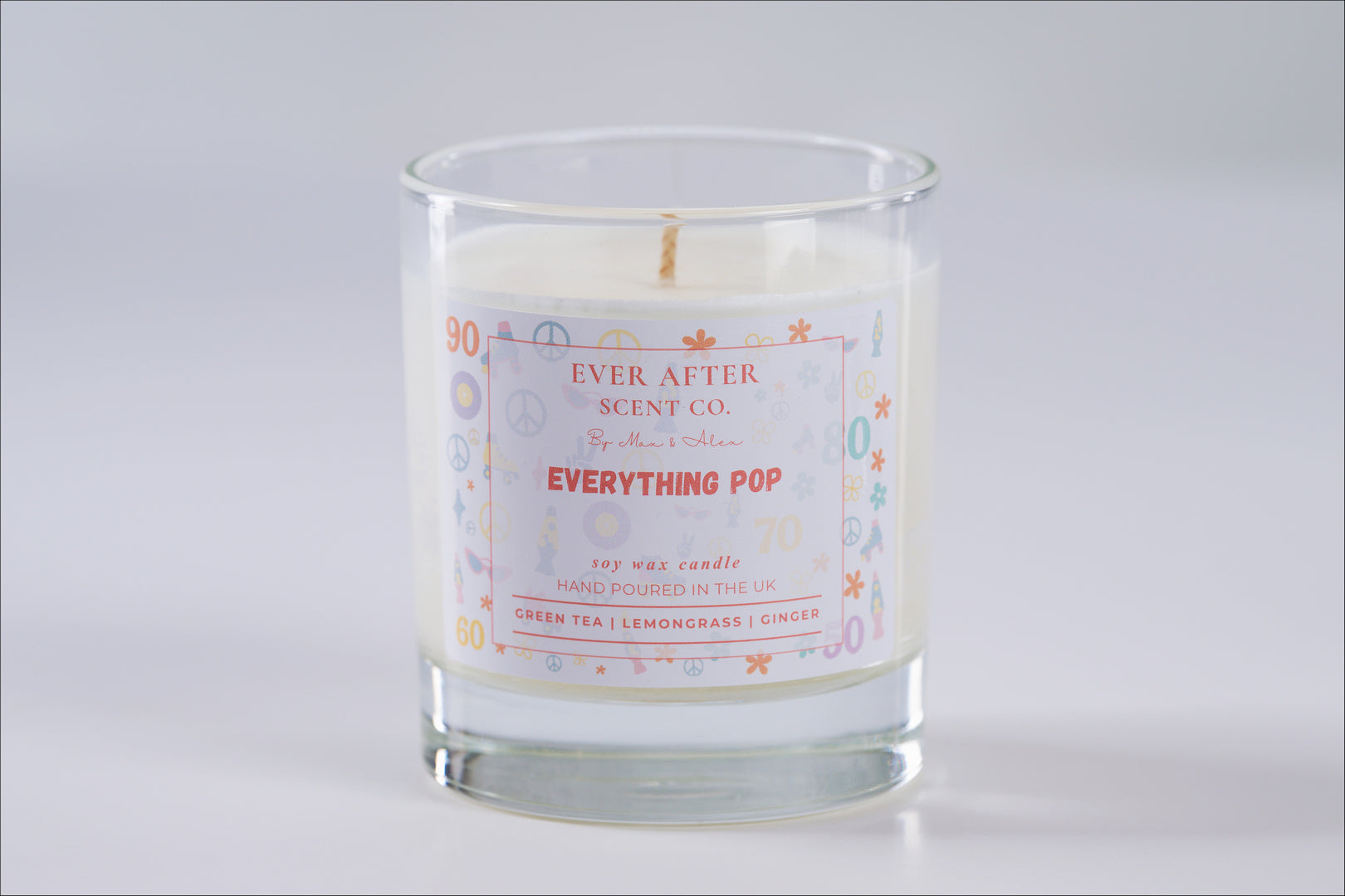 Candle with 'Ever After Scent Co.' label on a white background Everything POP