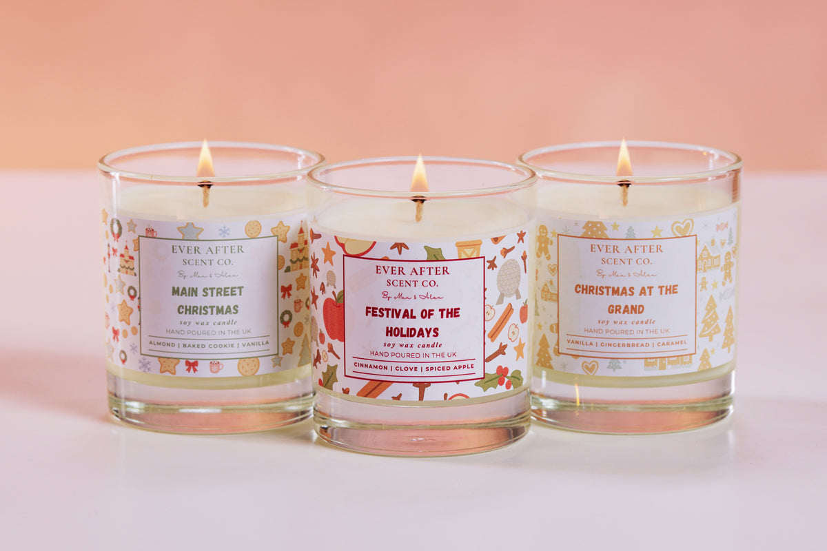 Three scented candles from Ever After Scent Co on a light pink background